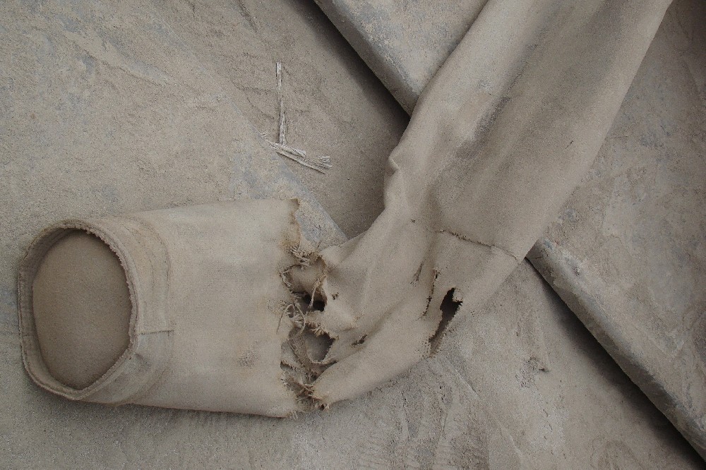 如何處理破損的除塵布袋？